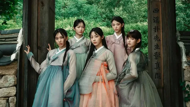 Five women wearing pastel hanbok at a traditional house