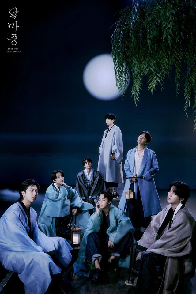 Seven members of a band in blue and grey hanbok